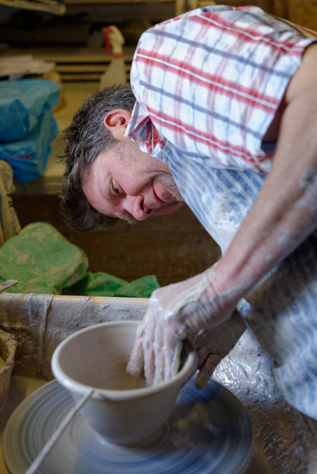 Muchelney Pottery 2014. John Leach’s pottery in Somerset. Mark Melbourne making lipped bowls.