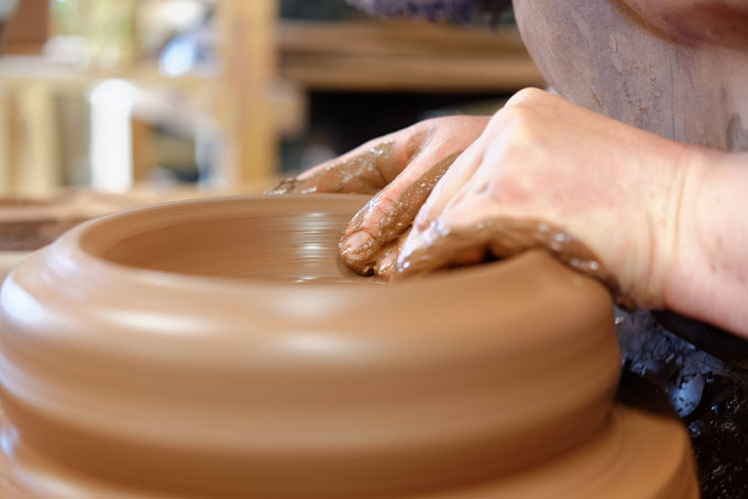 Paul Jessop at Barrington Pottery 2014 making a Pancheon
