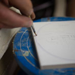 Tile making at Douglas Watson Studios - Neil Farmer decorating some Delft style Tiles
