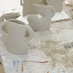 John and Jude Jelfs working together in their pottery in Bourton on the Water