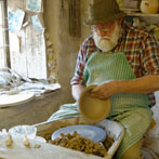 Muchelney Pottery 2014. John Leach’s pottery in Somerset. Mark Melbourne making lipped bowls.