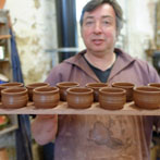 Paul Jessop at Barrington Pottery 2014 making small sauce pots