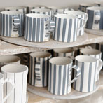 Sue Binns decorating in her studio in London 2013 - Cobalt is applied over a matt glaze.