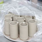 Sue Binns decorating in her studio in London 2013 - Cobalt is applied over a matt glaze.