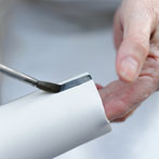 Sue Binns decorating in her studio in London 2013 - Cobalt is applied over a matt glaze.