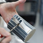 Sue Binns decorating in her studio in London 2013 - Cobalt is applied over a matt glaze.