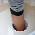 Sue Binns decorating in her studio in London 2013 - Cobalt is applied over a matt glaze.