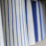 Sue Binns decorating in her studio in London 2013 - Cobalt is applied over a matt glaze.