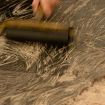 Merlyn Chesterman Printing a Woodblock print at Art in Action